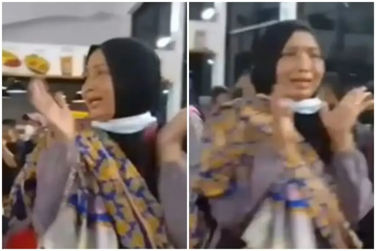Ekspresi ibu panik kehilangan anaknya yang berusia 18 bulan di Stasiun Pasar Turi, Surabaya, Jawa Timur.  (Sumber : Twitter/@Heraloebss)