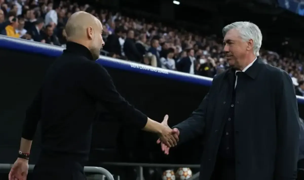 Pep Guardiola dan Carlo Ancelotti  (Sumber : Jonathan Moscrop/via 90min.com)
