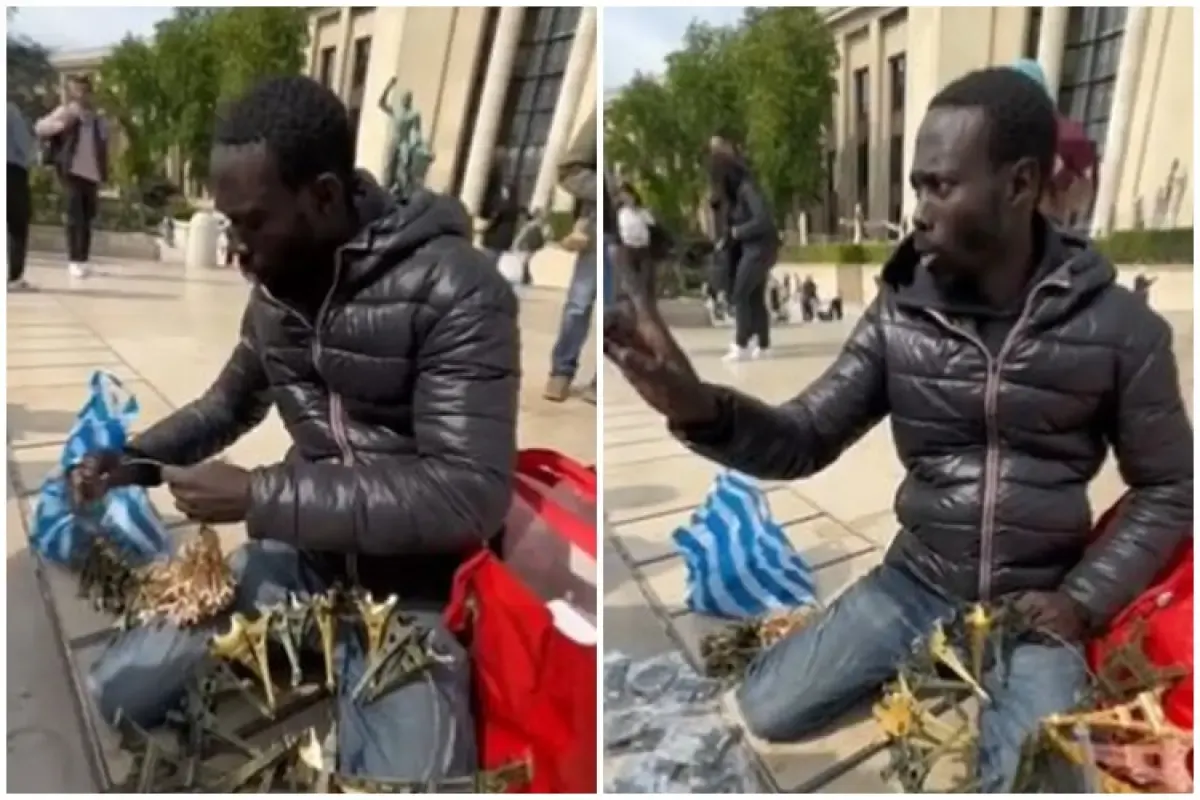 Potret penjual aksesori Menara Eiffel di Paris, Prancis, fasih berbahasa Indonesia.  (Sumber : Tangkapan layar Twitter/@Heraloebss)