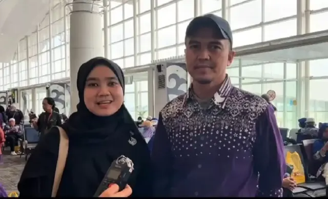 Jemaah Kloter JKS-12 Bawa Bolu Meranti Usai Alihkan Penerbangan ke Medan Gegara Ancaman Bom